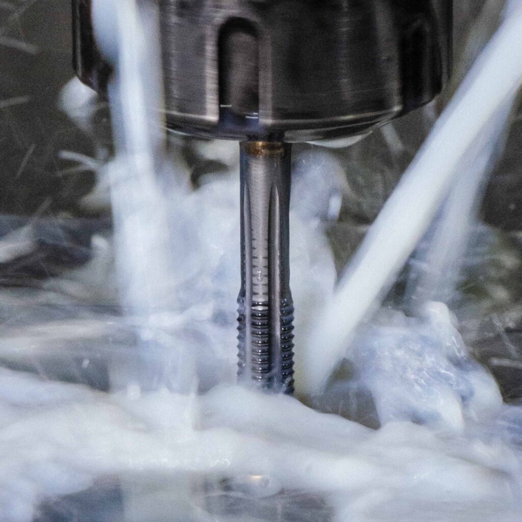 Water-miscible metalworking fluid