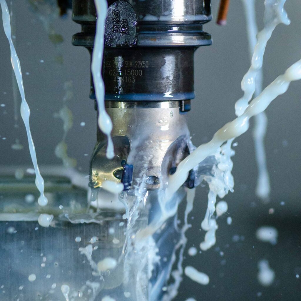 Water-miscible metalworking fluid